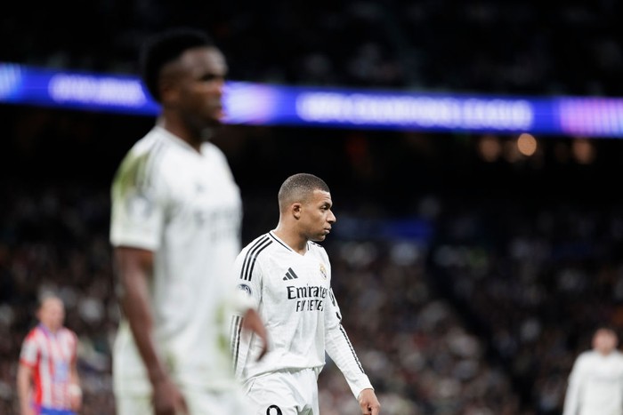 Kylian Mbappe Kylian Mbappe of Real Madrid and Vinicius Jr of Real Madrid participate in the UEFA Champions League 2024/25 Round of 16 First Leg match between Real Madrid and Atletico de Madrid at Santiago Bernabeu Stadium in Madrid, Spain, on March 4. (Photo by Guillermo Martinez)