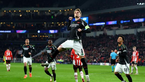 PSV Eindhoven vs Arsenal Soccer Football - Champions League - Round of 16 - First Leg - PSV Eindhoven v Arsenal - Philips Stadion, Eindhoven, Netherlands - March 4, 2025 Arsenal's Martin Odegaard celebrates scoring their fourth goal Action Images via Reuters/Matthew Childs