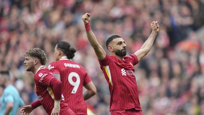 Liverpool, MOhamed Salah Liverpools Mohamed Salah celebrates after scoring his sides second goal during the English Premier League soccer match between Liverpool and Southampton at Anfield in Liverpool, Saturday, March 8, 2025. (AP Photo/Jon Super)