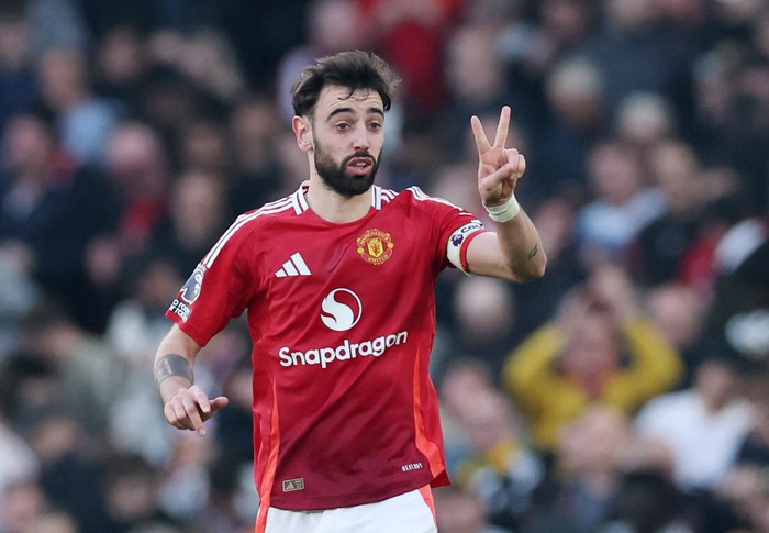 Bruno Fernandes Soccer Football - Premier League - Manchester United v Arsenal - Old Trafford, Manchester, Britain - March 9, 2025 Manchester United's Bruno Fernandes celebrates scoring their first goal REUTERS/Phil Noble EDITORIAL USE ONLY. NO USE WITH UNAUTHORIZED AUDIO, VIDEO, DATA, FIXTURE LISTS, CLUB/LEAGUE LOGOS OR 'LIVE' SERVICES. ONLINE IN-MATCH USE LIMITED TO 120 IMAGES, NO VIDEO EMULATION. NO USE IN BETTING, GAMES OR SINGLE CLUB/LEAGUE/PLAYER PUBLICATIONS. PLEASE CONTACT YOUR ACCOUNT REPRESENTATIVE FOR FURTHER DETAILS..