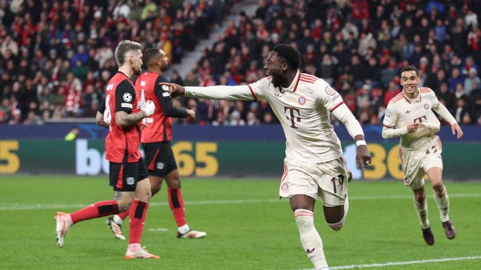 Leverkusen, Germany - March 11: Alphonso Davies of FC Bayern Muenchen celebrates after scoring his teams second goal during the UEFA Champions League 2024/25 Round of 16 Second Leg match between Bayer 04 Leverkusen and FC Bayern München at BayArena on March 11, 2025 in Leverkusen, Germany. (Photo by Oliver Kaelke/DeFodi Images via Getty Images)