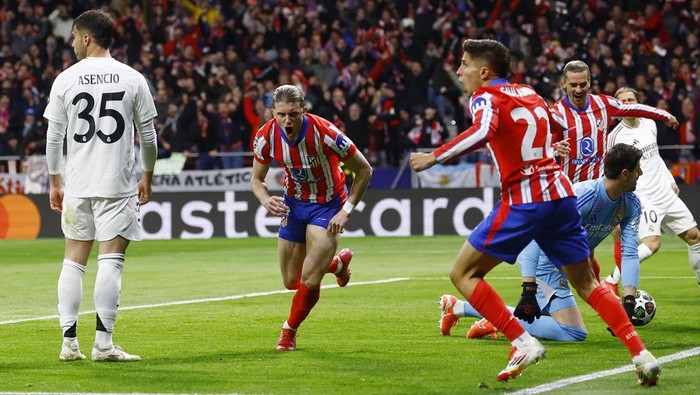 Soccer Football - Champions League - Round of 16 - Second Leg - Atletico Madrid v Real Madrid - Metropolitano, Madrid, Spain - March 12, 2025 Atletico Madrids Conor Gallagher celebrates scoring their first goal REUTERS/Susana Vera