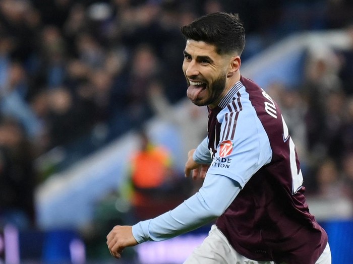Soccer Football - Champions League - Round of 16 - Second Leg - Aston Villa v Club Brugge - Villa Park, Birmingham, Britain - March 12, 2025 Aston Villa's Marco Asensio celebrates scoring their first goal REUTERS/Jaimi Joy