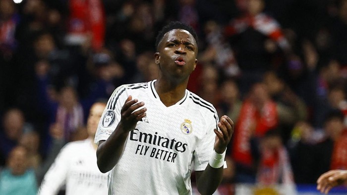 Vinicius Jr Soccer Football - Champions League - Round of 16 - Second Leg - Atletico Madrid v Real Madrid - Metropolitano, Madrid, Spain - March 12, 2025 Real Madrids Vinicius Junior reacts after missing a penalty REUTERS/Susana Vera