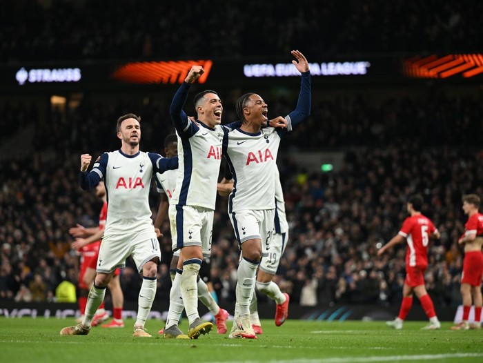 LONDON, ENGLAND - MARCH 13: Wilson Odobert of Tottenham Hotspur celebrates scoring his teams third goal with teammate Pedro Porro during the UEFA Europa League 2024/25 Round of 16 Second Leg match between Tottenham Hotspur and AZ Alkmaar at Tottenham Hotspur Stadium on March 13, 2025 in London, England. (Photo by Michael Regan - UEFA/UEFA via Getty Images)
