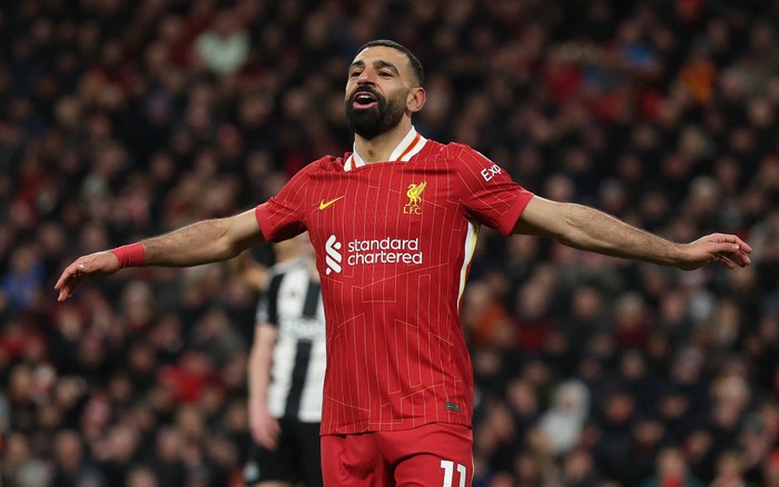Mohamed Salah Soccer Football - Premier League - Liverpool v Newcastle United - Anfield, Liverpool, Britain - February 26, 2025 Liverpool's Mohamed Salah reacts after Alexis Mac Allister scores their second goal REUTERS/Phil Noble EDITORIAL USE ONLY. NO USE WITH UNAUTHORIZED AUDIO, VIDEO, DATA, FIXTURE LISTS, CLUB/LEAGUE LOGOS OR 'LIVE' SERVICES. ONLINE IN-MATCH USE LIMITED TO 120 IMAGES, NO VIDEO EMULATION. NO USE IN BETTING, GAMES OR SINGLE CLUB/LEAGUE/PLAYER PUBLICATIONS. PLEASE CONTACT YOUR ACCOUNT REPRESENTATIVE FOR FURTHER DETAILS..