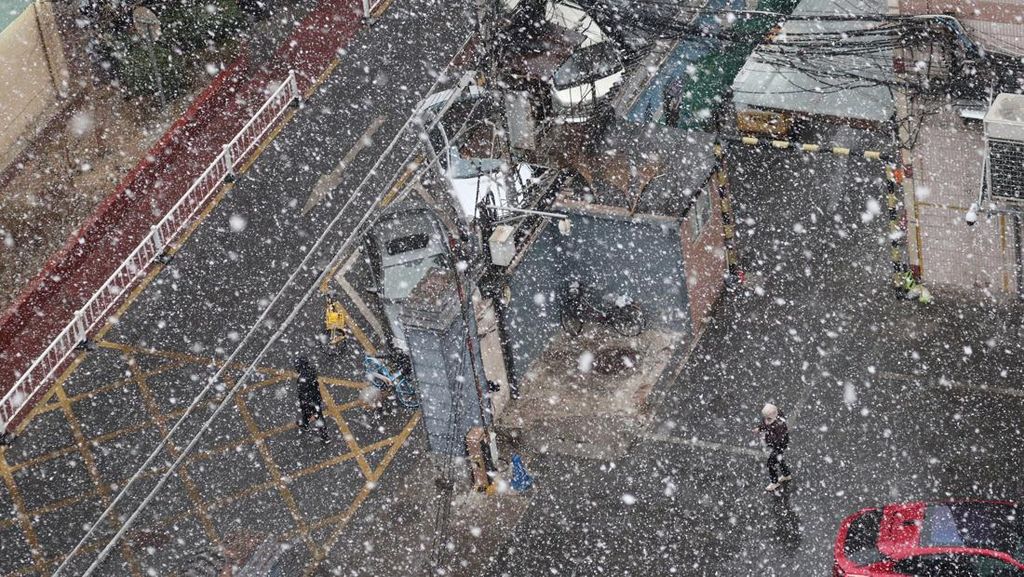 Potret Suasana Kota Beijing Diselimuti Hujan Salju Potret Suasana Kota Beijing Diselimuti Hujan Salju