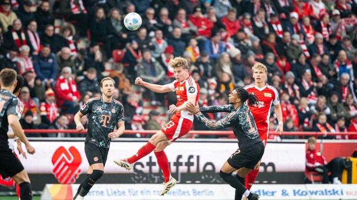 Union Berlin, Bayern Munich BERLIN, GERMANY - MARCH 15: Andras Schäfer from 1. FC Union Berlin and Michael Olise of FC Bayern Munich during the Bundesliga match between 1. FC Union Berlin and FC Bayern Munich on March 13, 2025 at Stadion an der alten Foersterei in Berlin, Germany. (Photo by Mathias Renner / City-Press GmbH Bildagentur via Getty Images)
