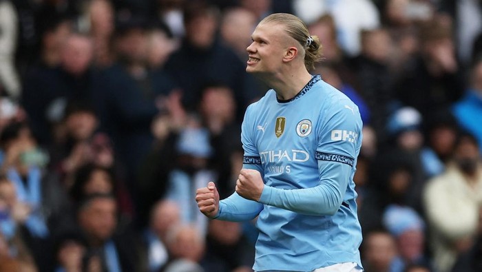 Erling Haaland Soccer Football - Premier League - Manchester City v Brighton & Hove Albion - Etihad Stadium, Manchester, Britain - March 15, 2025 Manchester City's Erling Haaland celebrates scoring their first goal Action Images via Reuters/Lee Smith EDITORIAL USE ONLY. NO USE WITH UNAUTHORIZED AUDIO, VIDEO, DATA, FIXTURE LISTS, CLUB/LEAGUE LOGOS OR 'LIVE' SERVICES. ONLINE IN-MATCH USE LIMITED TO 120 IMAGES, NO VIDEO EMULATION. NO USE IN BETTING, GAMES OR SINGLE CLUB/LEAGUE/PLAYER PUBLICATIONS. PLEASE CONTACT YOUR ACCOUNT REPRESENTATIVE FOR FURTHER DETAILS..