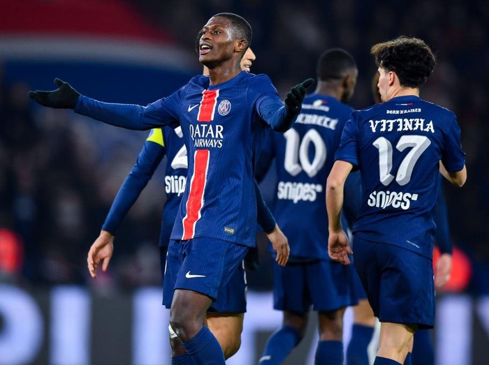 PARIS, FRANCE - MARCH 16: Nuno Mendes of PSG celebrates after scoring his team's second goal during the Ligue 1 match between Paris Saint-Germain FC and Olympique de Marseille at Parc des Princes on March 16, 2025 in Paris, France. (Photo by Franco Arland/Getty Images)