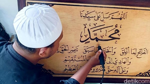Raup Cuan dari Kaligrafi Lukis Bakar