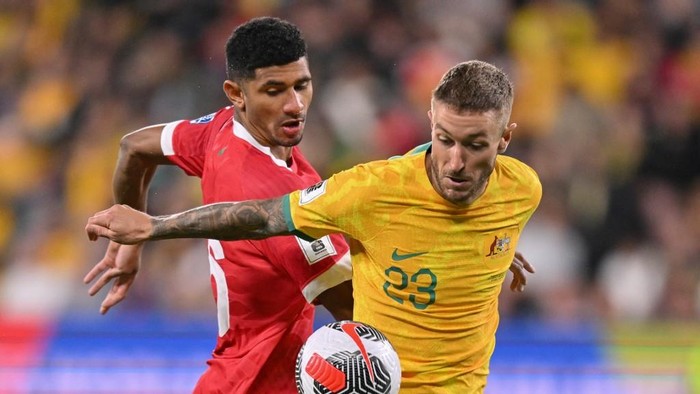 Lebanons Walid Shour (L) and Australias Adam Taggart (R) compete for the ball during the FIFA World Cup 2026 qualifier football match between Australia and Lebanon at CommBank Stadium in Sydney on March 21, 2024. (Photo by Izhar KHAN / AFP) / -- IMAGE RESTRICTED TO EDITORIAL USE - STRICTLY NO COMMERCIAL USE --