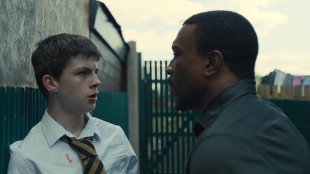 Adolescence. (L to R) Kaine Davies as Ryan Kowalsky, Ashley Walters as Detective Inspector Bascombe, in Adolescence. Cr. Courtesy of Netflix © 2024