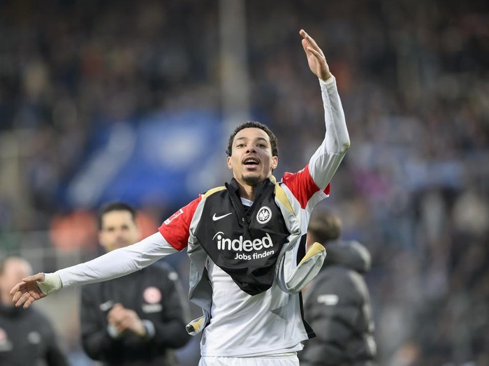 Hugo Ekitike of Eintracht Frankfurt celebrates at the end of the German Bundesliga soccer match between VfL Bochum and Eintracht Frankfurt at the Vonovia Ruhrstadion. in Bochum, Germany, Sunday, March 16, 2025. (Anke Wälischmiller/dpa via AP)