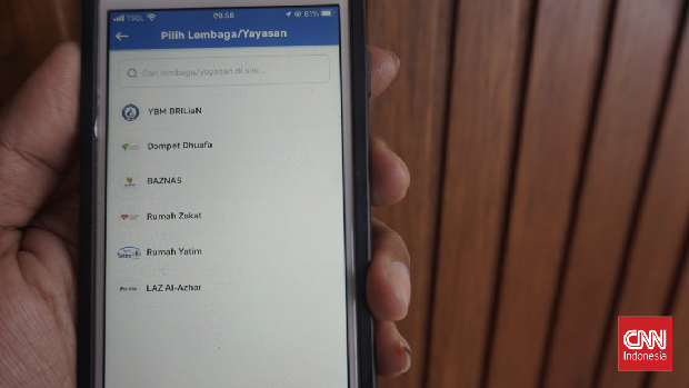 Layanan pembayaran zakat dan infaq bisa diakses melalui aplikasi BRI, BRImo. (CNN Indonesia/Feri Agus Setyawan)
