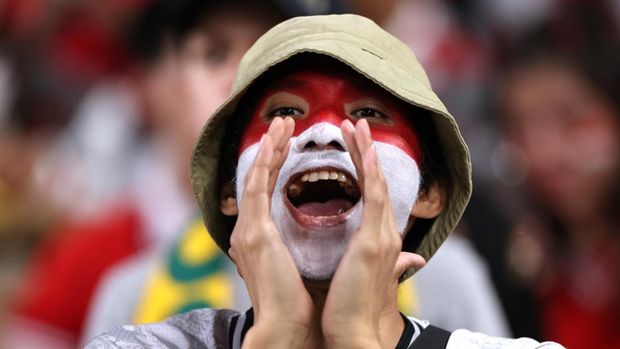 Soccer Football - World Cup - AFC Qualifiers - Third Round - Group C - Australia v Indonesia - Allianz Stadium, Sydney, Australia - March 20, 2025 An Indonesia fan is seen inside the stadium before the match REUTERS/Hollie Adams