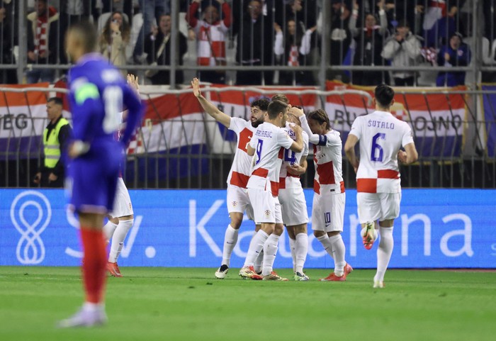 Soccer Football - Nations League - Quarter Final - First Leg - Croatia v France - Stadion Poljud, Split, Croatia - March 20, 2025 Croatia's Ivan Perisic celebrates with teammates after scoring their second goal REUTERS/Antonio Bronic