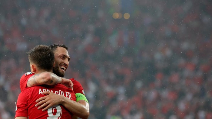 DORTMUND, GERMANY - JUNE 18: Arda Guler of Turkey celebrates the third goal 2-1 with Hakan Calhanoglu of Turkey  during the  EURO match between Turkey  v Georgia  at the Signal Iduna Park on June 18, 2024 in Dortmund Germany (Photo by Rico Brouwer/Soccrates/Getty Images)