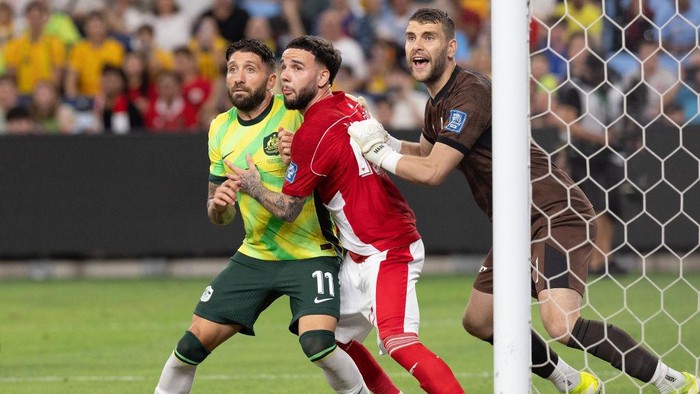 SYDNEY, AUSTRALIA - MARCH 20: Brandon Borrello of Australia is marked in the six yard box by Indonesias Calvin Verdonk and Maarten Vincent Paes during the round three FIFA 2026 World Cup AFC Asian Qualifier match between Australia Socceroos and Indonesia at Allianz Stadium on March 20, 2025 in Sydney, Australia. (Photo by Steve Christo - Corbis/Corbis via Getty Images)