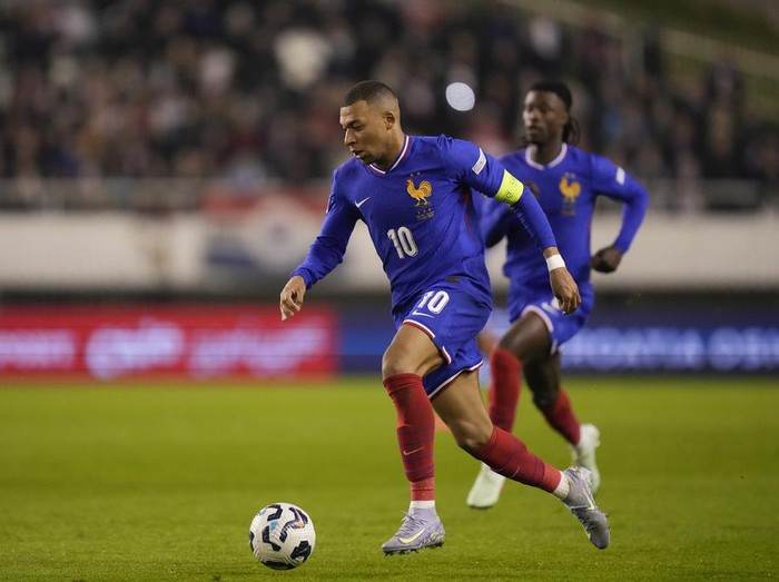 France's Kylian Mbappe controls the ball during the UEFA Nations League quarterfinal soccer match between Croatia and France, at the Poljud stadium in Split, Croatia, Thursday, March 20, 2025. (AP Photo/Darko Bandic)