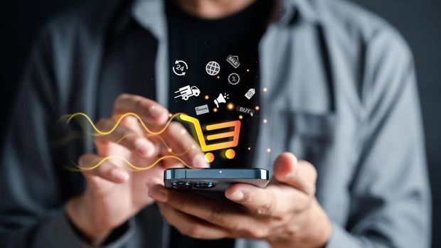 ilustrasi belanja online Shopping online payment concept. Man hand using smart phone with cart delivery icon, banking and online shopping via banking mobile app, E-transaction and financial technology.