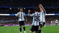 Argentina. Lolos pada 25 Maret 2025, menjadi tim pertama yang lolos ke Piala Dunia 2026 dari zona Amerika Selatan. Foto: REUTERS/Agustin Marcarian