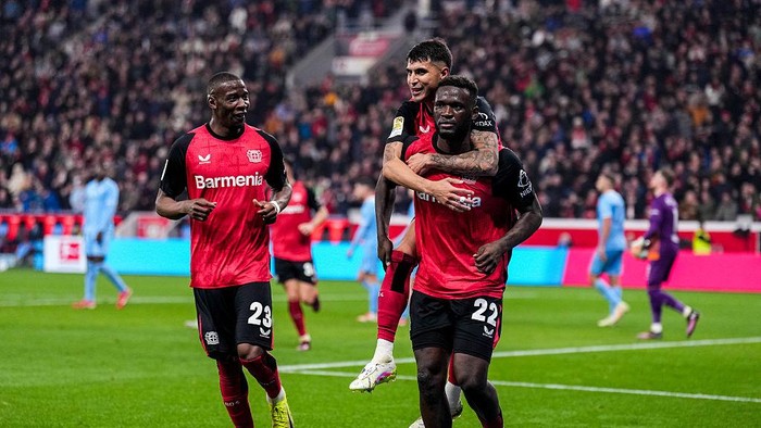 Bayer Leverkusen vs Bochum LEVERKUSEN, GERMANY - MARCH 28: Exequiel Palacios of Bayer 04 Leverkusen and Victor Boniface of Bayer 04 Leverkusen celebrate their teams second goal during the Bundesliga match between Bayer 04 Leverkusen and VfL Bochum 1848 at BayArena on March 28, 2025 in Leverkusen, Germany. (Photo by Rene Nijhuis/MB Media/Getty Images)