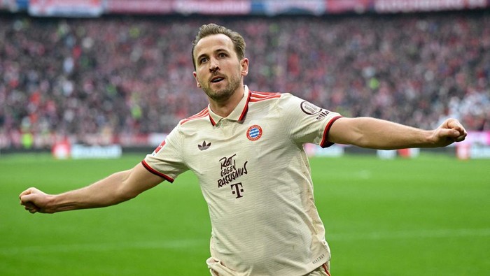 Harry Kane Soccer Football - Bundesliga - Bayern Munich v St. Pauli - Allianz Arena, Munich, Germany - March 29, 2025 Bayern Munichs Harry Kane celebrates after Leroy Sane scores their third goal REUTERS/Angelika Warmuth DFL REGULATIONS PROHIBIT ANY USE OF PHOTOGRAPHS AS IMAGE SEQUENCES AND/OR QUASI-VIDEO. TPX IMAGES OF THE DAY