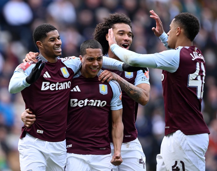 PRESTON, ENGLAND - MARCH 30: Marcus Rashford of Aston Villa celebrates scoring his teams second goal from the penalty spot with teammates Youri Tielemans, Boubacar Kamara and Jacob Ramsey (obscured) during the Emirates FA Cup Quarter Final match between Preston North End and Aston Villa at Deepdale on March 30, 2025 in Preston, England. (Photo by Stu Forster/Getty Images)