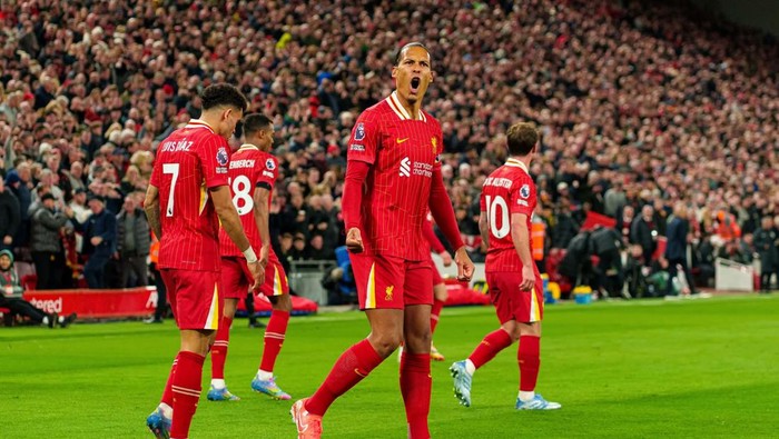2207644806 Liverpools Virgil van Dijk celebrates after Diogo Jota scores their first goal during the Premier League match between Liverpool and Everton at Anfield in Liverpool, England, on April 2, 2025. (Photo by Steven Halliwell | MI News/NurPhoto via Getty Images)