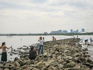 Menikmati Libur Lebaran di Pantai Marunda Jakarta Menikmati Libur Lebaran di Pantai Marunda Jakarta