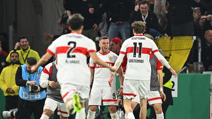 Stuttgart vs RB Leipgiz 02 April 2025, Baden-Württemberg, Stuttgart: Soccer: DFB Cup, VfB Stuttgart - RB Leipzig, semi-final, MHPArena: Stuttgarts Nick Woltemade (r) celebrates after his goal to make it 2-0 with Stuttgarts Ermedin Demirovic (m) and Stuttgarts Ameen Al-Dakhil (l) joins in. Photo: Tom Weller/dpa (Photo by Tom Weller/picture alliance via Getty Images)