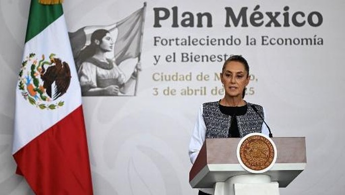 Mexicos President Claudia Sheinbaum speaks during the presentation of the so-called Plan Mexico aimed at strengthening the economy at the Anthropology Museum in Mexico City on April 3, 2025. Mexican President Claudia Sheinbaum welcomed her country being excluded from the list of nations targeted in US President Donald Trumps latest round of tariffs. (Photo by Yuri CORTEZ / AFP)