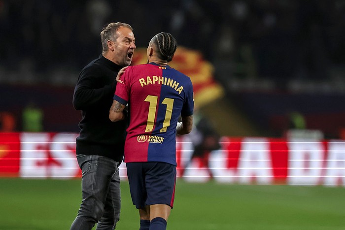 Raphinha BARCELONA, SPAIN - APRIL 05: Hansi Flick, head coach of FC Barcelona stops Raphinha Dias Belloli when he was about to protest to the assistant referee at the end of the match, the Spanish league, La Liga EA Sports, football match played between FC Barcelona and Real Betis at Estadi Olimpic Lluis Companys on April 05, 2025 in Barcelona, Spain. (Photo By Javier Borrego/Europa Press via Getty Images)