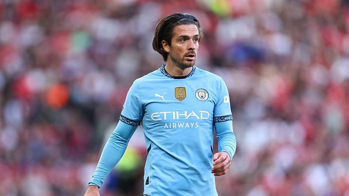 Jack Grealish MANCHESTER, ENGLAND - APRIL 6: Jack Grealish of Manchester City during the Premier League match between Manchester United FC and Manchester City FC at Old Trafford on April 6, 2025 in Manchester, England. (Photo by Robbie Jay Barratt - AMA/Getty Images)