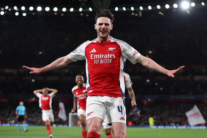 LONDON, ENGLAND - APRIL 8: Declan Rice of Arsenal celebrates after scoring a goal to make it 2-0 during the UEFA Champions League 2024/25 Quarter Final First Leg match between Arsenal FC and Real Madrid C.F. at Arsenal Stadium on April 8, 2025 in London, England. (Photo by Catherine Ivill - AMA/Getty Images)