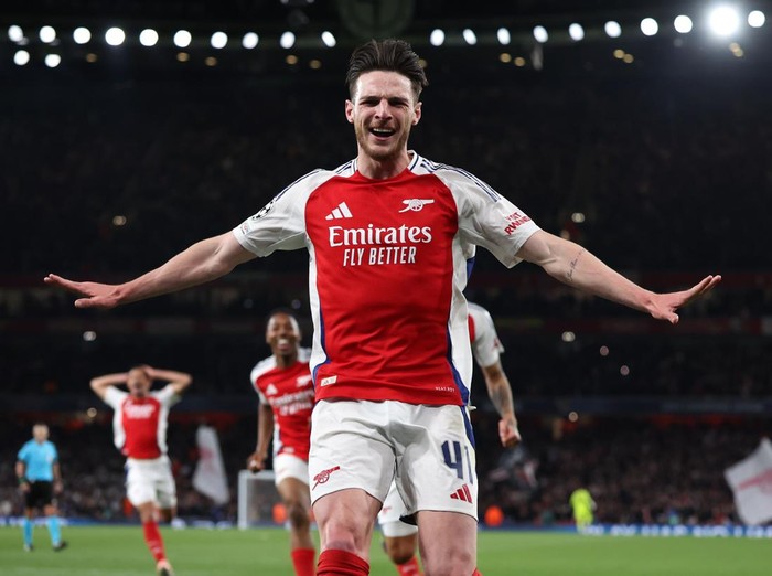 LONDON, ENGLAND - APRIL 8: Declan Rice of Arsenal celebrates after scoring a goal to make it 2-0 during the UEFA Champions League 2024/25 Quarter Final First Leg match between Arsenal FC and Real Madrid C.F. at Arsenal Stadium on April 8, 2025 in London, England. (Photo by Catherine Ivill - AMA/Getty Images)