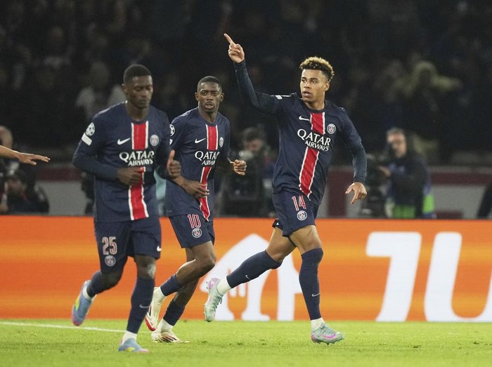 PSG's Desire Doue celebrates after scoring his side's first goal during the Champions League quarterfinal first leg soccer match between Paris Saint-Germain and Aston Villa at Parc des Princes stadium in Paris, Wednesday, April 9, 2025. (AP Photo/Thibault Camus)
