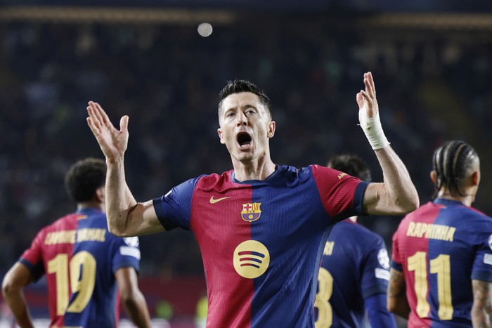 Robert Lewandowski Barcelonas Robert Lewandowski celebrates after scoring his sides third goal during the Champions League quarterfinals first leg soccer match between Barcelona and Borussia Dortmund, at the Lluis Companys Olympic stadium in Barcelona, Spain, Wednesday, April 9, 2025. (AP Photo/Joan Monfort)