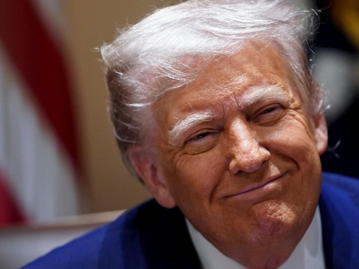 U.S. President Donald Trump attends a cabinet meeting at the White House in Washington, D.C., U.S., April 10, 2025. REUTERS/Nathan Howard