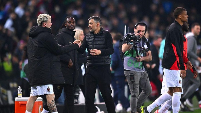 UDINE, ITALY - APRIL 11: Sergio Conceicao head coach of AC Mila of AC Milan celebrates during the Serie A match between Udinese and AC Milan at Stadio Friuli on April 11, 2025 in Udine, Italy. (Photo by Alessandro Sabattini/Getty Images)
