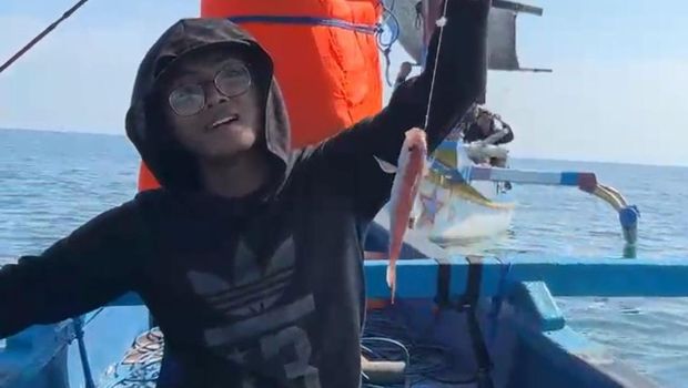 Memancing di Pantai Greenthing