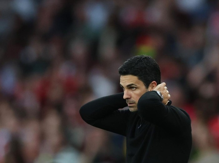 Soccer Football - Premier League - Arsenal v Brentford - Emirates Stadium, London, Britain - April 12, 2025 Arsenal manager Mikel Arteta reacts Action Images via Reuters/Paul Childs EDITORIAL USE ONLY. NO USE WITH UNAUTHORIZED AUDIO, VIDEO, DATA, FIXTURE LISTS, CLUB/LEAGUE LOGOS OR 'LIVE' SERVICES. ONLINE IN-MATCH USE LIMITED TO 120 IMAGES, NO VIDEO EMULATION. NO USE IN BETTING, GAMES OR SINGLE CLUB/LEAGUE/PLAYER PUBLICATIONS. PLEASE CONTACT YOUR ACCOUNT REPRESENTATIVE FOR FURTHER DETAILS..