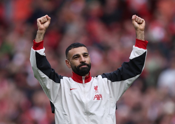 Soccer Football - Premier League - Liverpool v West Ham United - Anfield, Liverpool, Britain - April 13, 2025 Liverpools Mohamed Salah celebrates after the match REUTERS/David Klein EDITORIAL USE ONLY. NO USE WITH UNAUTHORIZED AUDIO, VIDEO, DATA, FIXTURE LISTS, CLUB/LEAGUE LOGOS OR LIVE SERVICES. ONLINE IN-MATCH USE LIMITED TO 120 IMAGES, NO VIDEO EMULATION. NO USE IN BETTING, GAMES OR SINGLE CLUB/LEAGUE/PLAYER PUBLICATIONS. PLEASE CONTACT YOUR ACCOUNT REPRESENTATIVE FOR FURTHER DETAILS..