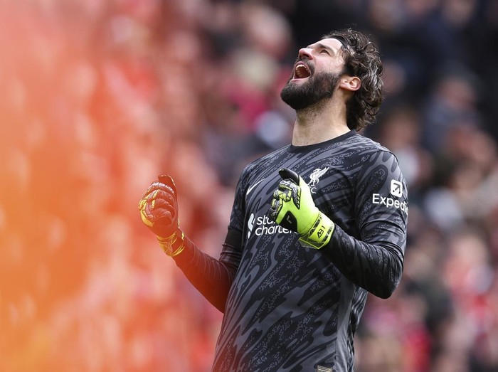 LIVERPOOL, ENGLAND - APRIL 13: Alisson Becker, goalkeeper of Liverpool celebrates after winning the Premier League match between Liverpool FC and West Ham United FC at Anfield on April 13, 2025 in Liverpool, England. (Photo by Ed Sykes/Sportsphoto/Allstar via Getty Images)