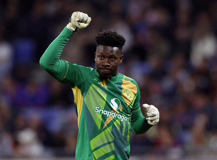 Soccer Football - Europa League - Quarter Final - First Leg - Olympique Lyonnais v Manchester United - Groupama Stadium, Lyon, France - April 10, 2025 Manchester Uniteds Andre Onana celebrates their second goal scored by Manchester Uniteds Joshua Zirkzee Action Images via Reuters/Andrew Couldridge