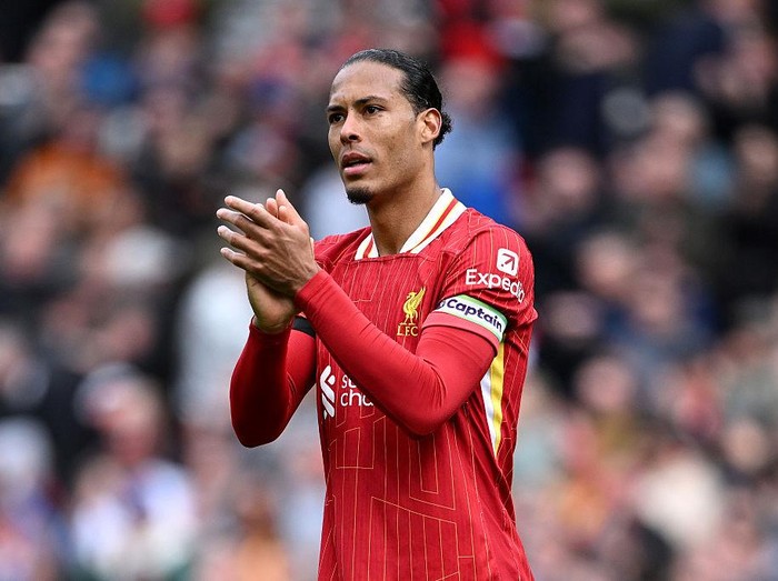 LIVERPOOL, ENGLAND - APRIL 13: Virgil van Dijk of Liverpool  celebrates victory after the Premier League match between Liverpool FC and West Ham United FC at Anfield on April 13, 2025 in Liverpool, England. (Photo by Justin Setterfield/Getty Images)
