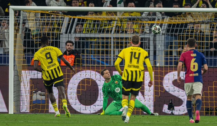 DORTMUND, GERMANY - APRIL 15: Serhou Yadaly Guirassy of Borussia Dortmund scores his team's first goal by penalty during the UEFA Champions League 2024/25 Quarter Final Second Leg match between Borussia Dortmund and FC Barcelona at BVB Stadion Dortmund on April 15, 2025 in Dortmund, Germany. (Photo by Boris Streubel/Getty Images)