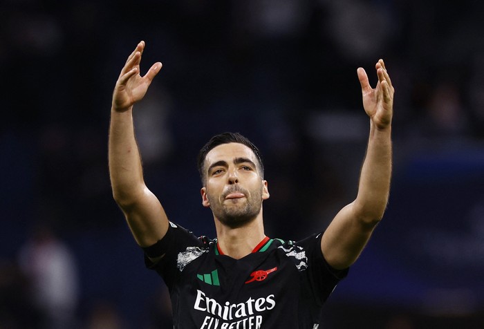 Soccer Football - Champions League - Quarter Final - Second Leg - Real Madrid v Arsenal - Santiago Bernabeu, Madrid, Spain - April 16, 2025 Arsenals Mikel Merino celebrates after the match REUTERS/Susana Vera