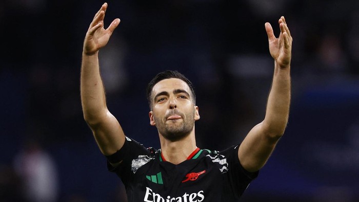Soccer Football - Champions League - Quarter Final - Second Leg - Real Madrid v Arsenal - Santiago Bernabeu, Madrid, Spain - April 16, 2025 Arsenals Mikel Merino celebrates after the match REUTERS/Susana Vera